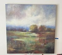 Full view of the wall art painting showing the muted fall colored field and trees landscape in a square shape.