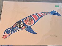 Single seal print by Sean R. Dixon, signed and numbered 09/88, showing stylized seal in red, blue, black, and white on cream paper.