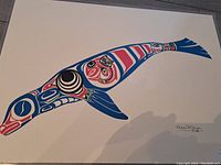 A perspective image on the floor showing the print in its entirety including signature and edition number 09/88 in the bottom right corner.