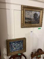 Both paintings hanging side by side showing relative size and style