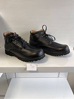 Left side angled view of black men's comfort shoes size 45XW, showing smooth leather, laces, and rugged outsole.