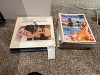 Photo showing a vintage vinyl record cover for Doctor Zhivago soundtrack and a stack of vintage magazines including Palm Springs Life.