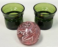 Two green glass votive candleholders with flared rims and embossed Dansk Denmark marks