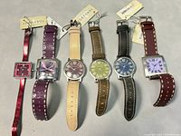 Full set of seven TokyoBoy wrist watches in various colors and styles, new with tags attached.