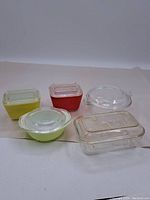 Listing photo showing all five Pyrex containers and jars arranged on a white surface.