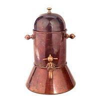 Front view of antique copper espresso coffee maker with spout, handles and dome lid