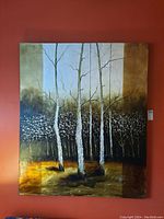 Front view of the signed canvas painting showing birch trees and abstract foliage.