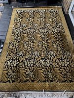 Top view of wool area rug showing full pattern and borders