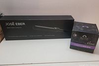 José Eber ceramic curling iron in box, with Sutra Moroccan Hair Mask box beside it.