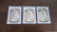 Three Kevin Gausman rookie baseball cards displayed in a row, each in a plastic protective sleeve.