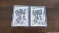Two Rod Brind'Amour St. Louis Blues rookie hockey cards side by side in protective sleeves.