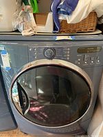 Front-facing view of dryer showing door and control panel