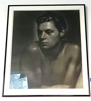 Frontal view of framed print hanging on wall