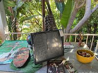 Overall view of assorted items on deck table