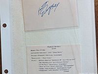 Handwritten note listing movies and TV shows featuring Patrick Dempsey.