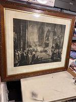 Framed large print showing the full scene inside Westminster Abbey during the Jubilee celebration, presented in an ornate wooden frame.