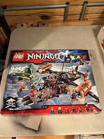 Front of sealed LEGO Ninjago box showing set artwork, set number 70605, piece count 754, recommended age