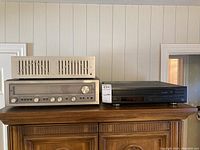 Wide shot showing Luxman G-11 equalizer, Luxman R-3045 tuner-amplifier and Yamaha CDC-635 CD player