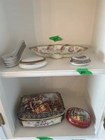 Shelf display showing oval tray, 3 small trinket boxes with lids, and 6 amuse bouchon spoons stacked