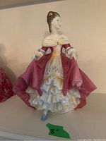 Front view of Royal Doulton Southern Belle figurine showing dress details and facial features