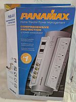 Front view of the Panamax PM8-AV power management device box showcasing branding and key features.
