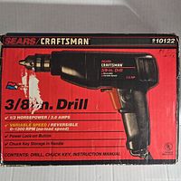 Original red and black box for Sears Craftsman 3/8-inch drill with specifications and included contents listed.