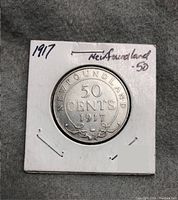 Obverse side of the 1917 Newfoundland 50 cents coin showing denomination and year.