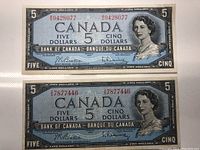Front view of the two 1954 Canadian five-dollar banknotes, showing the design and serial numbers