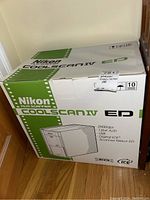 Closed original Nikon Coolscan IV ED box showing model and features