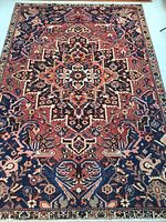 Full top-down view of the rug showing central medallion and border