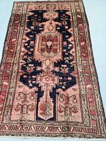 Full view of the rectangular rug showing central medallion and borders