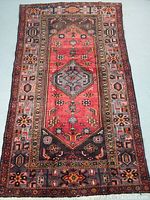 Full view of rug showing overall design and condition