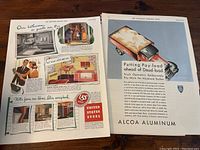 Stack of vintage large format magazine advertisements, featuring colorful United States Steel and Alcoa Aluminum ads.