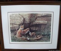 Full front view of the wood framed print showing fox family in natural setting, matted and under glass.