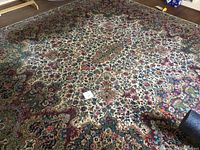 Full view of Karastan area rug showing overall pattern and condition