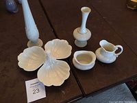 Full set displayed on table: tall bud vase, ribbed bud vase, candy dish, sugar bowl, cream pitcher
