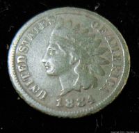 Obverse side of the 1884 Indian Head one cent coin, showing the Native American head with feathered headdress and date 1884.