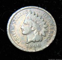 Front (obverse) side of the 1890 Indian Head one cent coin showing Lady Liberty with feather headdress and date 1890