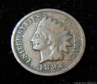 Obverse side of the 1892 Indian Head one cent coin showing the profile of Lady Liberty with headdress and date.