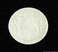 Reverse side showing detailed royal coat of arms with crown and inscriptions including the year 1917.