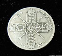 Reverse of 1920 Great Britain One Florin silver coin showing four crowned shields and denomination/date.
