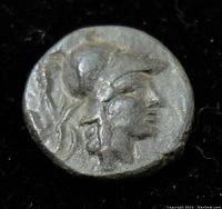 Obverse of the ancient Mysia bronze Pergamon coin showing the detailed helmeted head in profile.