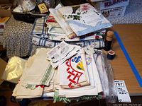 Overview of stacked linens and napkins on table