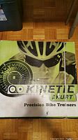 Photo of the box front showing the Kinetic by Kurt branding and 'Precision Bike Trainers' text.