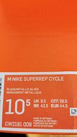 Close-up of shoe box label showing model as Nike SuperRep Cycle, size 10.5 US, black/metallic silver color.