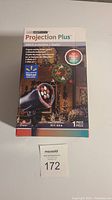 Boxed Gemmy Projection Plus Whirl-a-motion Static Christmas light projector showing product image and specs.