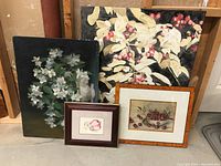 Overview of four botanical artworks: two large canvases and two smaller framed watercolors.