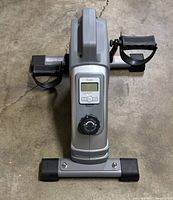 Top view showing the front panel of the Sunny pedal bike including digital display and resistance knob.