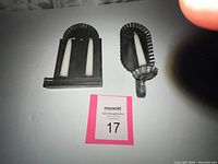 Two reproduction candle holders against a plain background with MaxSold lot card number 17.