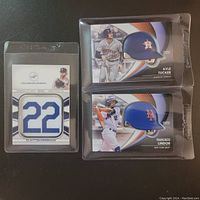 Front view of three limited edition MLB trading cards featuring Kyle Tucker, Francisco Lindor, and Clayton Kershaw in sealed plastic sleeves.